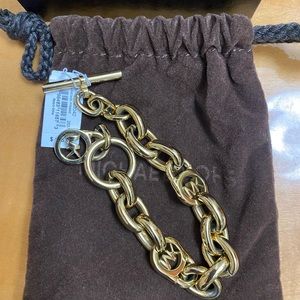 MK gold colored bracelet